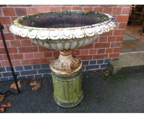 Victorian cast iron shallow urn planter with egg and dart decoration to rim on stone column plinth ( 30" diameter, stands 34"