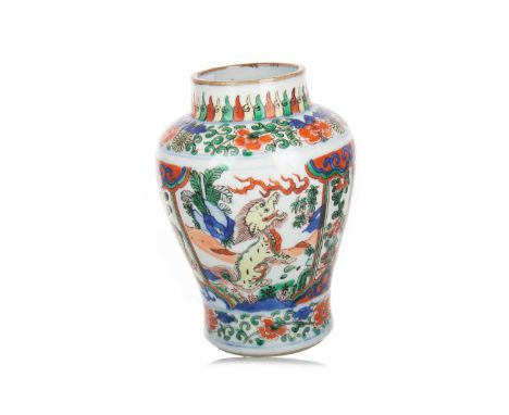 CHINESE WUCAI VASE LIKELY LATE 18TH / EARLY 19TH CENTURY baluster form with cafe-au-lait glazed rim, decorated in enamels wit