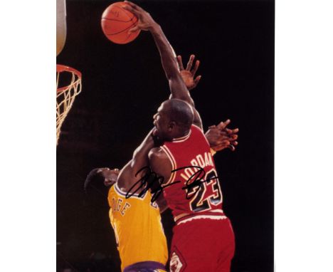 JORDAN MICHAEL: (1963-     ) American Basketball Player. Signed colour 8 x 10 photograph, the image depicting Jordan in a thr