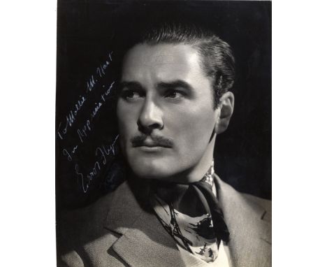 FLYNN ERROL: (1909-1959) Australian Actor. Vintage signed and inscribed 7.5 x 9.5 photograph of Flynn in a head and shoulders