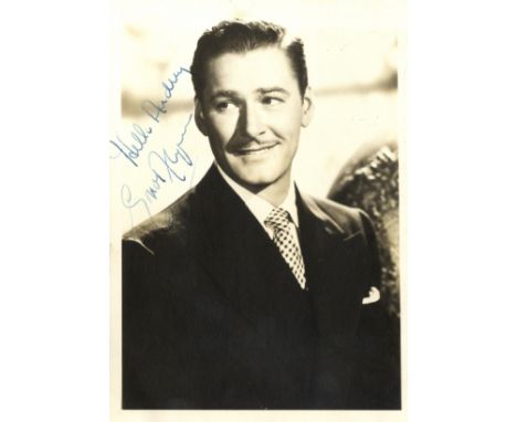 FLYNN ERROL: (1909-1959) Australian Actor. Vintage signed and inscribed sepia 5 x 7 photograph of Flynn in a half length pose