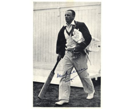 BRADMAN DON: (1908-2001) Australian Cricketer. Signed 4 x 6 photograph, the image depicting Bradman in a full length pose hol