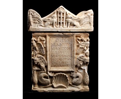 A Roman marble cinerary urn with lid 1st-2nd century AD; 48 cm (18,89 in) high; Square in form, finely sculpted lid with eagl