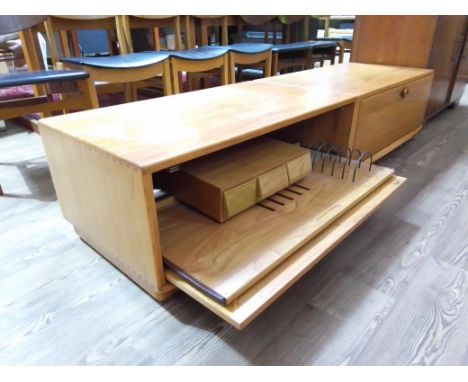 A pair of Ercol blonde elm low AV cabinets.  