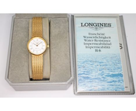 A ladies 9ct gold Longines bracelet watch, case diam. 21mm, length 14cm/15cm, gross wt. 23.1g, with box and papers.&nbsp;Cond