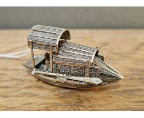 A novelty Chinese silver model of a boat, gross wt. 21.6 g. 