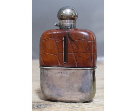 A George V silver hip flask, croc effect leather and silver bound glass, silver top with bayonet fitting, G &amp; J W Hawksle