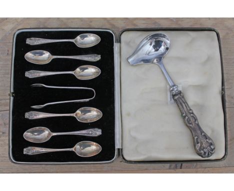 A csed set of six hallmarked silver spoons with sugar tongs and a Norwegian ladle with handle marked 'STERLING'.  