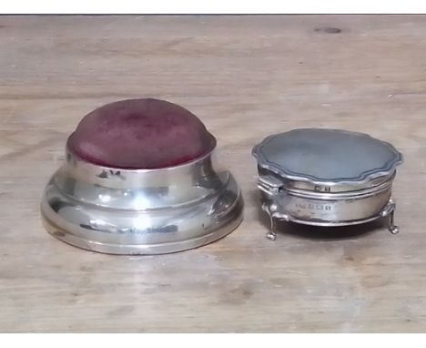 A hallmarked silver pin cushion and trinket box.  