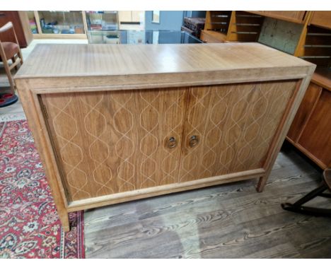 A 1950s Gordon Russell 'Double Helix' sideboard, model R407, designed by David Booth and Judith Ledeboer for Gordon Russell, 