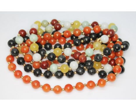 A group of three jade bead necklaces, each with clasp marked '14K', length 46cm each.  