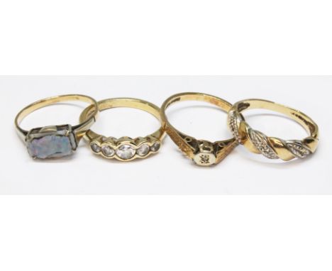 A group of four rings comprising an opal triplet ring indistinctly marked '9c', a hallmarked 9ct gold diamond solitaire ring,