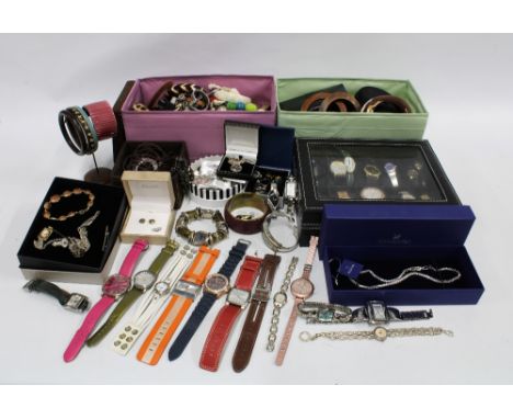 A quantity of silver and costume jewellery to include Thomas Sabo, Swarovski, Sheila Fleet and others with a collection of la