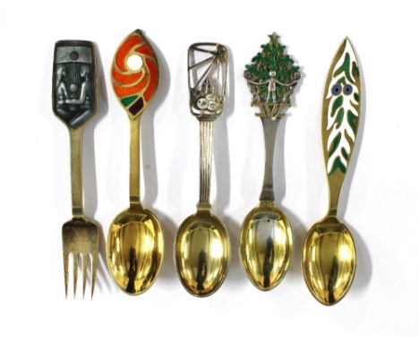 Danish silver and silver-gilt year spoons by Anton Michelsen  1938, 1970 &amp; 1971 together with another with pierced enamel