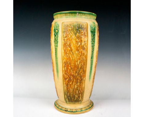 Wide mouthed floor vase with light glaze over green and brown raised design. Manufacturer: RosevilleCountry of Origin: United