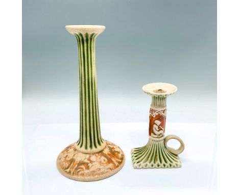 2 slender neck candle holders with green and creamed colored Corinthians and cherubs set against brown ground. Candle holder 