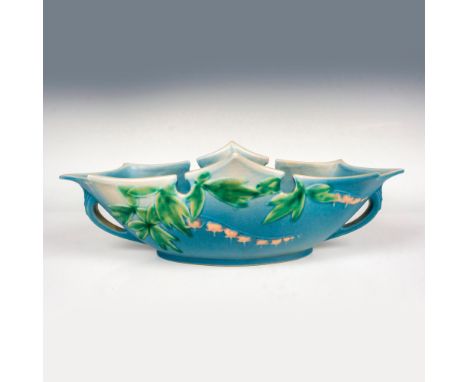 Exquisite long tapered decorative bowl in light blue glaze with Bleeding Hearts decoration. Embossed Roseville USA 384 to bas