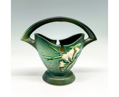 Lovely basket design with keyhole cuts on rim is finished in light glaze over earth green, accented with raised floral design