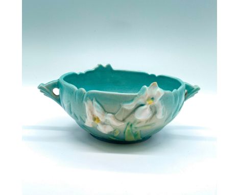 Lovely double-handled ceramic bowl in blue adorned with a depiction of white Iris flowers on both the front and back. Inset "