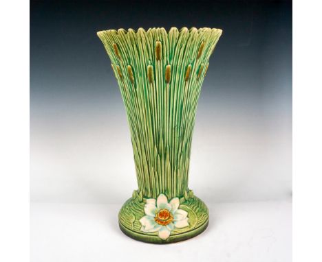 Flared floor vase with light glaze over green and brown cattail design with peach colored flower at base. Issued: 20th centur