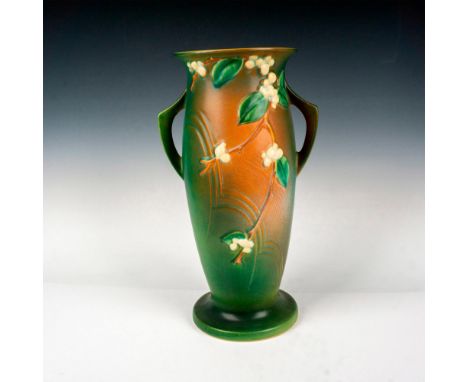 Large double handled vase with light glaze finish over green and rust coloration with snowberries in eggshell with green leaf