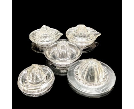 Nice-looking collection of vintage juicers in clear glass, two are tray juicers and three are juicer tops. One is stamped Eas