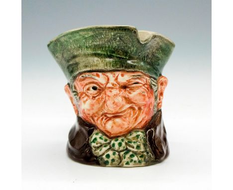 Decorated in soft green with bow tie and hat. Old Charley name impressed in back base. Impressed 8232. Issued: 20th centuryDi
