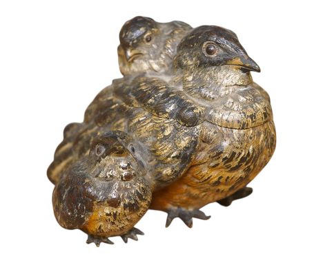 A novelty Austrian cold painted bronze ‘bird and chicks’ inkwell, 10cm wide. Condition - lacking liner, fair to good