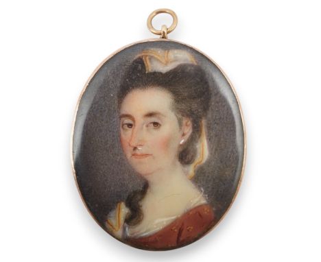 An early 19th century portrait miniature of a lady with Miers style silhouette of a gentleman verso, gold framed, 4.5cm high 