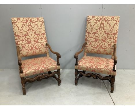 A pair of Louis XIV style walnut open armchairs, width 66cm, height 121cm. Condition - light rubbing to arms otherwise good