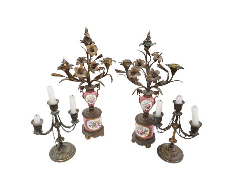 A pair of French porcelain mounted gilt metal candelabra and one other pair, tallest 45cm. Condition - fair