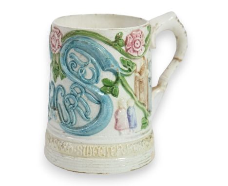 A Compton pottery mug, decorated with St Nicholas on a pilgrimage, 12cm high. Condition - poor