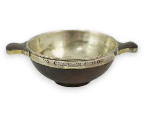 An early 19th century silver mounted yew wood quaich, inscribed 'Scuab As E' to the bowl and 'To Charles Gibson / From A Butt