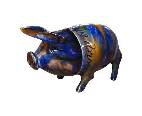 A Rye Pottery lustre glazed pig with detachable head, incised “Wunt Be Druv”, 9cm wide. Condition - fairHook device at top of