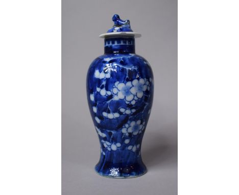 A Late 19th Century Chinese Blue and White Lidded Vase with Prunus Pattern Decoration Having Four Character Mark for Kangxi t