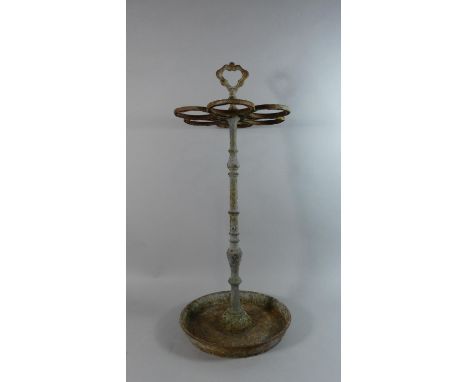 A 19th Century Cast Iron Six Division Stick and Umbrella Stand on Circular Tray Base, 65cms High 