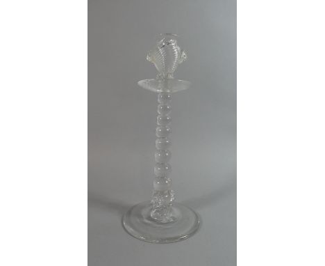 A Glass Candlestick with Bobbin Support, Vase Candle Holder and Lion Mask Mouldings, 26.5cms High. Diamond Registration Mark 