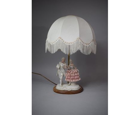 An Irish Figural Table Lamp and Shade by Mahoona Lighting, 53cm high 