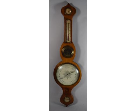 A 19th Century Onion Top Walnut Wheel Barometer with Thermometer, Hydrometer and Spirit Level, 95cms High 