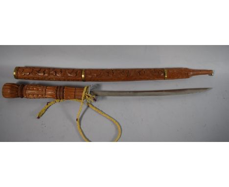 A Carved Wooden Souvenir Tribal Sword in Scabbard 