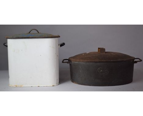 An Oval Cast Iron Lidded Cooking Pot and an Enamel Bread Bin 