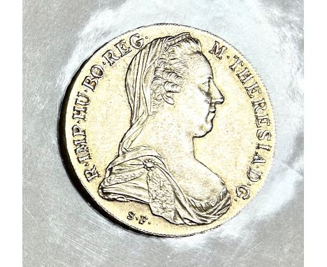 Maria-Theresien-Taler, Silber 835, 28,08g.Vorderseite mit Portrait von Maria Theresia, Rückseite Wappen 1870.Durchmesser 4 cm