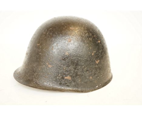 WWII helmet with leather fittings 