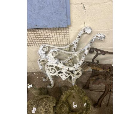 Pair of decorative cast iron bench ends