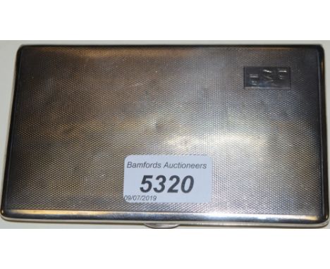 A silver engine turned cigarette case, Birmingham 1959