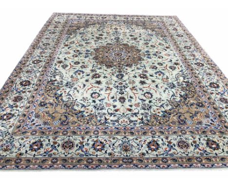 FINE ISPHAHAN DESIGN PERSIAN CARPET, 415cm x 318cm, central medallion on a jade palmette and vine field within corresponding 