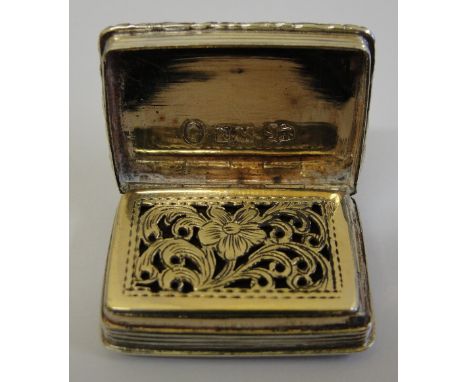 A Nathaniel Mills silver vinaigrette:
Engine turned decoration with gilt floral lid to interior, monogram AMT to cartouche to