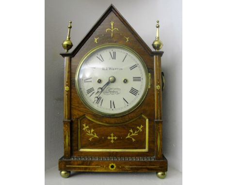 A Victorian Rosewood and Brass Inlaid Bracket Clock:
the case of architectural form with brass finials and inlay on ball feet