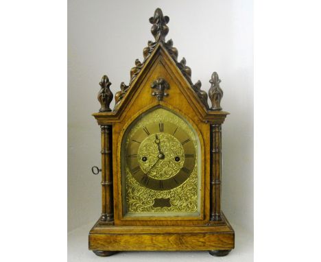 A Georgian Bracket Clock by J Whitelaw, Edinburgh:
of small dimensions.  Architectural form set with pillars and acanthus fin