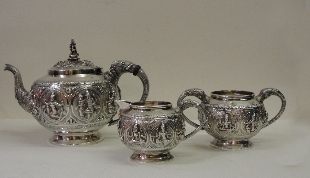 A 19th Century Silver Anglo-Indian Three-Piece Tea Set: the teapot with ...